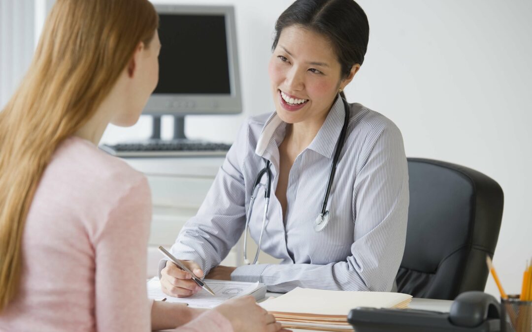 woman consulting lady doctor