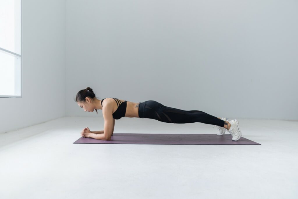 a woman doing plank