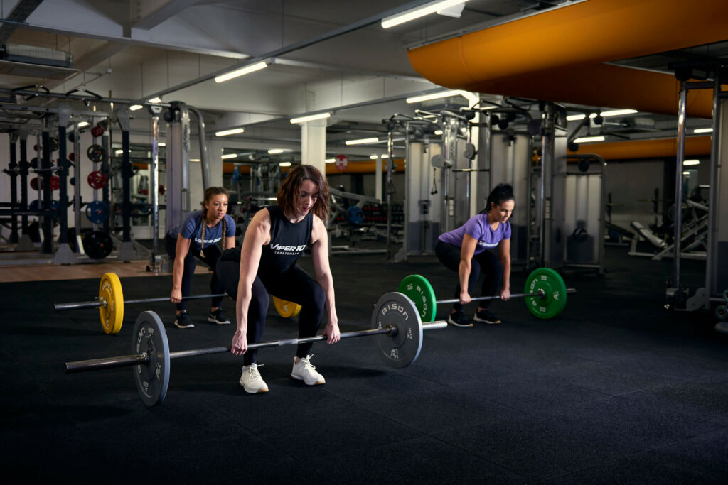 women lifting weight