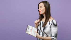 a woman holding calendar