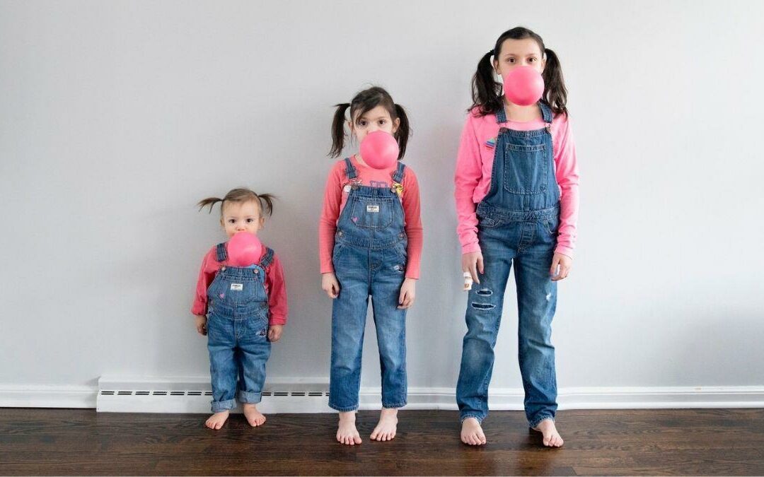 girls having different heights standing